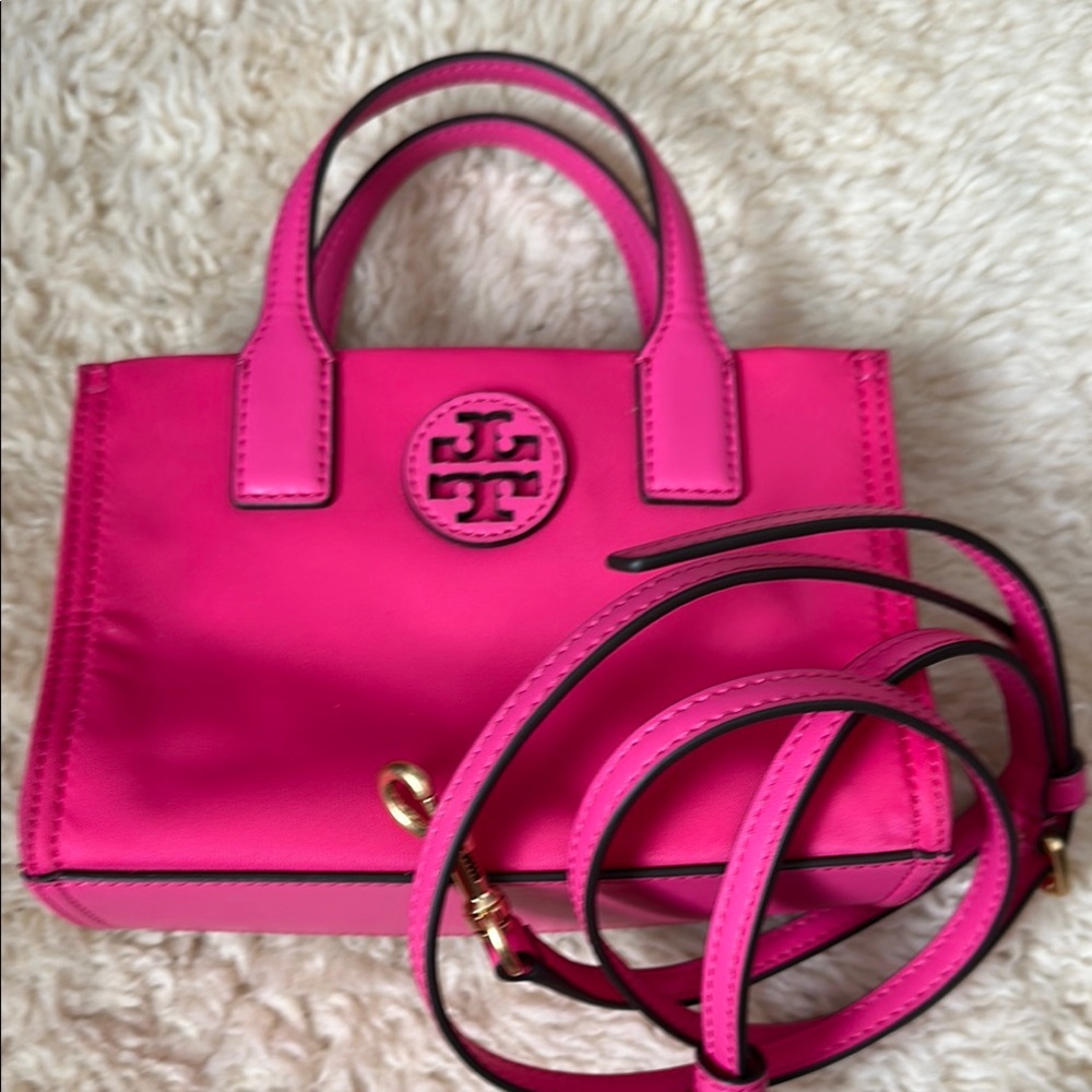 Authentic Tory Burch Pink Mini Bag with Gold Logo
Look like new